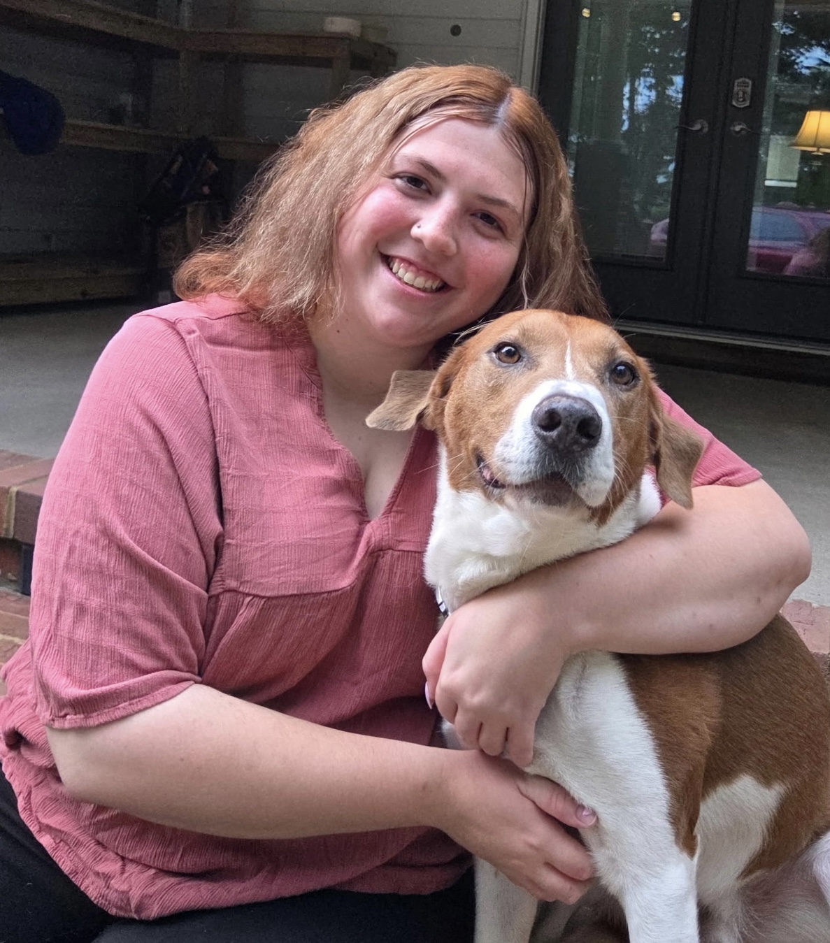 Rebecca Hirschman with a dog at Ballypines Dog Ranch